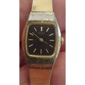 SEIKO WOMEN'S 2C20-5559 QUARTZ WATCH GOLD TONE BAND BLACK DIAL,CASE IS GOLD TONE